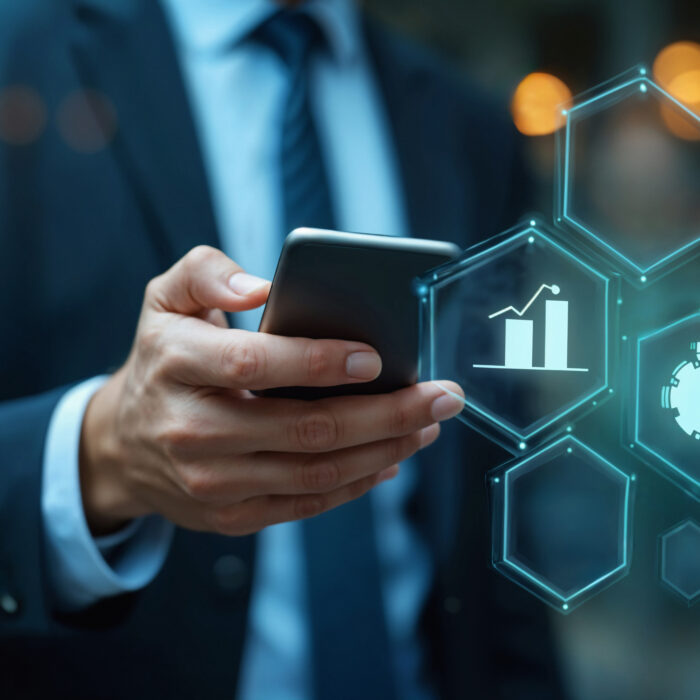 person-holding-smartphone-with-business-data-overlay