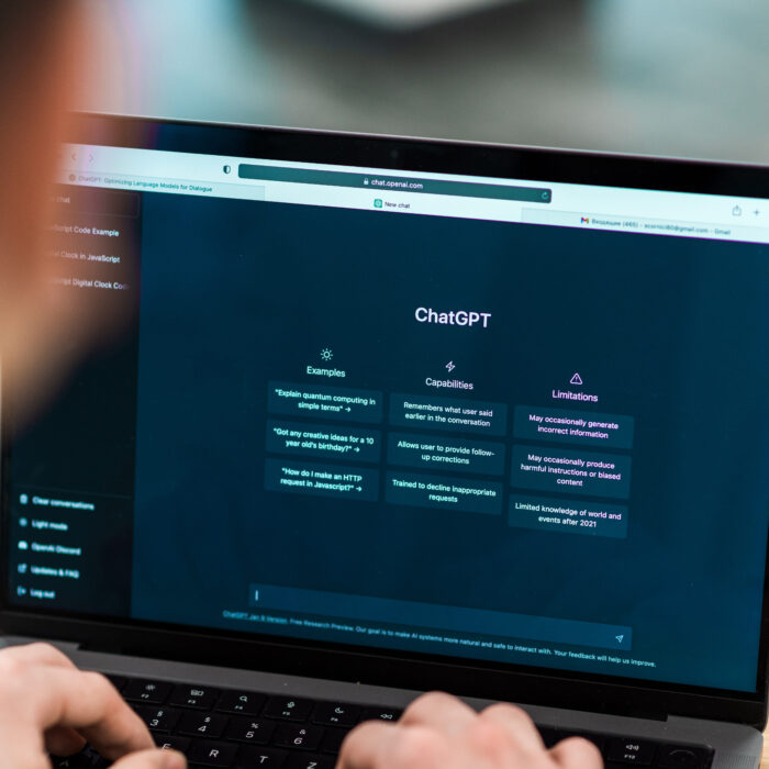A modern search interface highlights AI overviews optimization and ChatGPT integration at the top of the results.